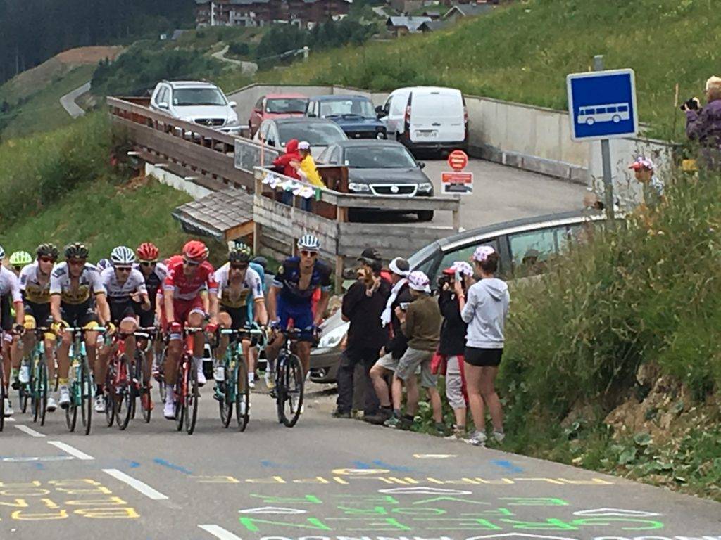 The 2017 Tour de France peloton climbing in the Grenoble area.