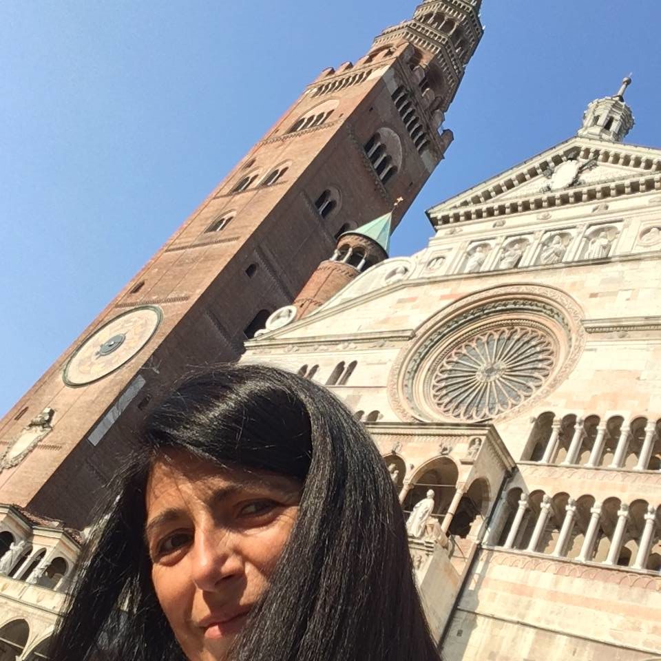 Your host Francesca Carmichael below the cathedral (Duomo) and bell tower (Torrazzo) in her home town of Cremona.