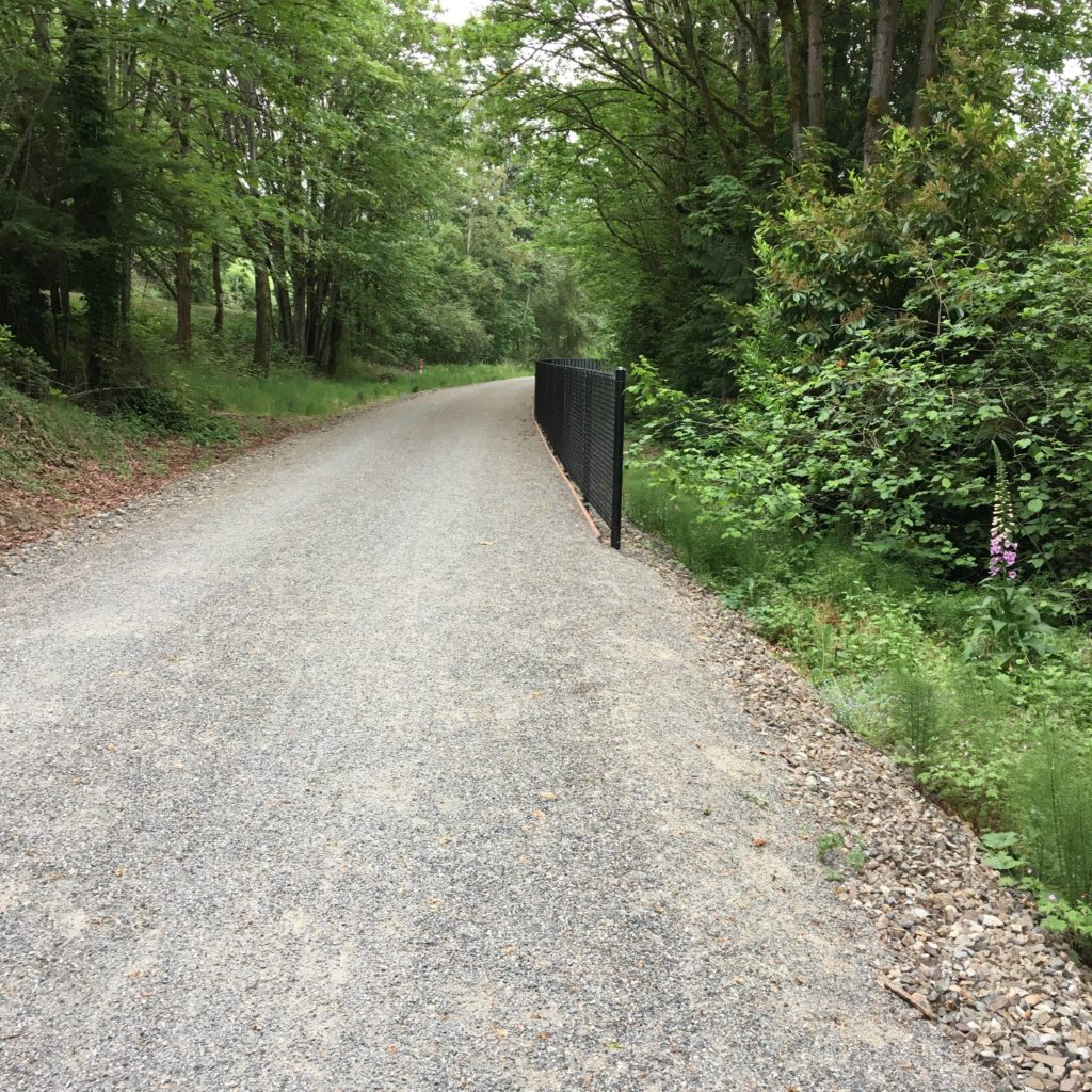 The Eastside Rail Corridor Trail and the East Lake Sammamish Trail have small-grained firmly packed gravel that is suitable for standard road bike tires.