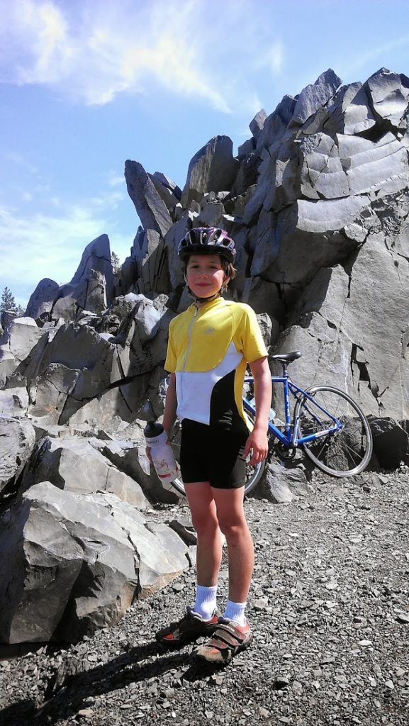 9 year old Adrian at the summit of Old McKenzie Hwy near Sisters, Oregon.