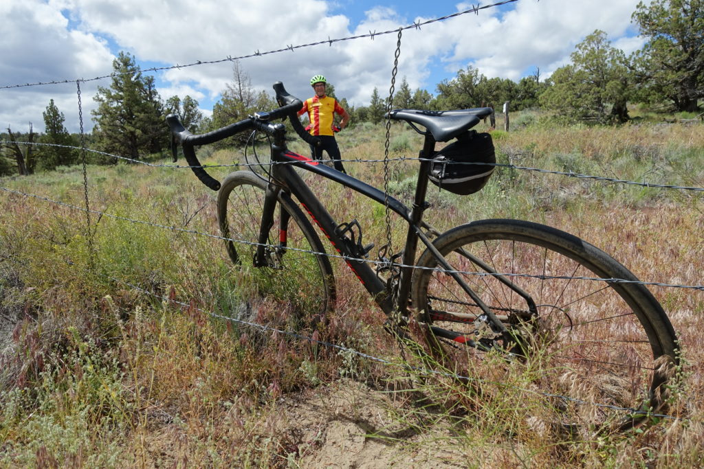 Horse to Horse: It's not a legit gravel ride until you climb a barbed wire fence to access some singletrack.