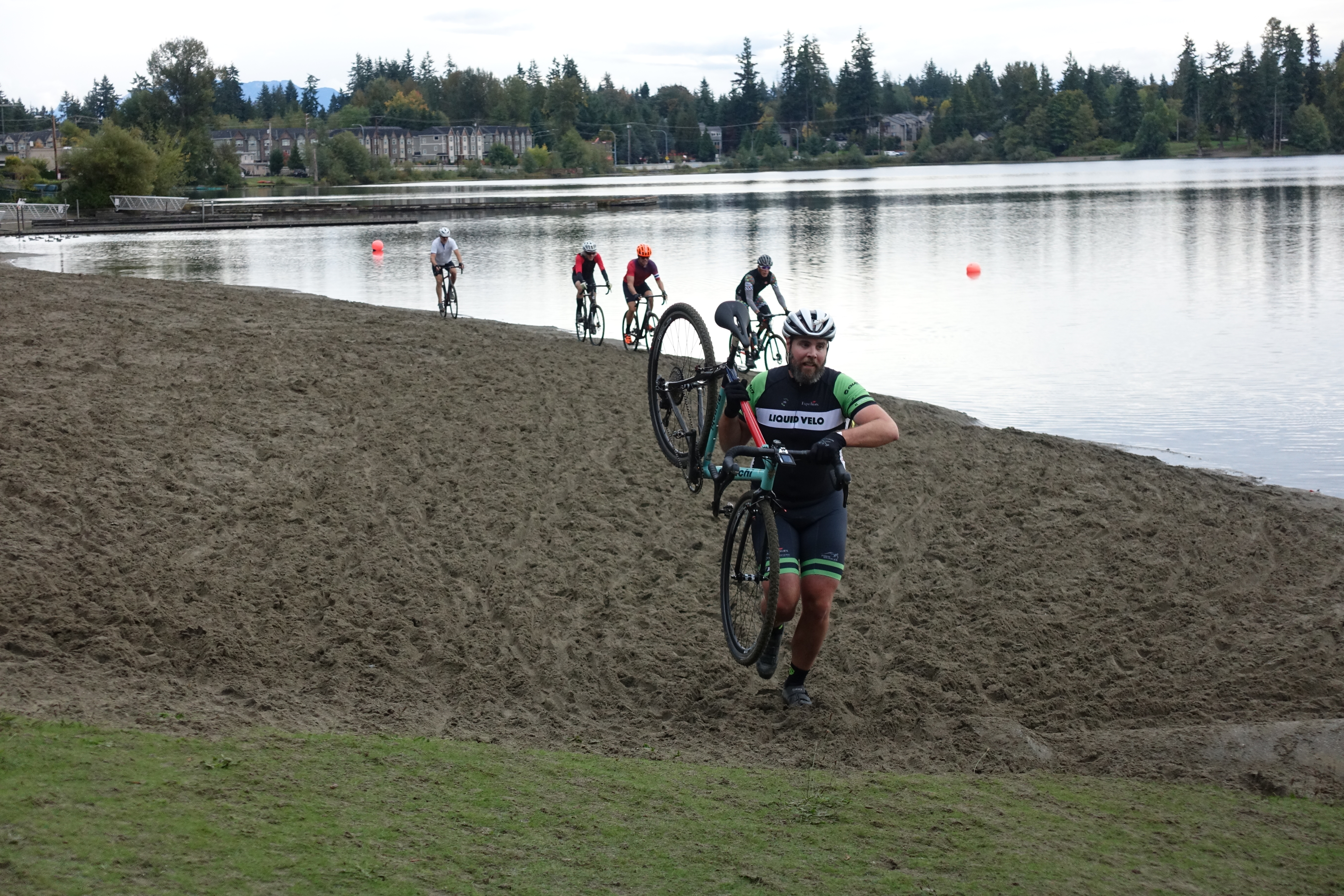 This Liquid Velo racer was all smiles running up the berm at the end of the beach section.