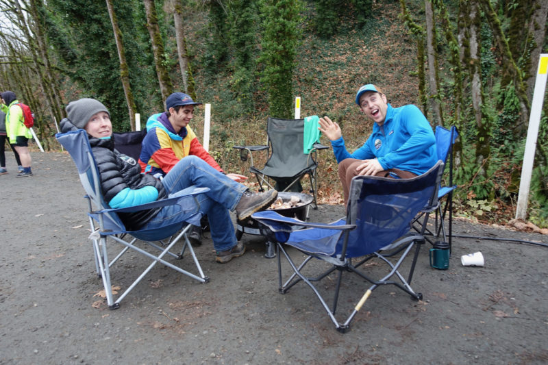 With the runners out, course manager Richard Kresser takes a break at the campfire.