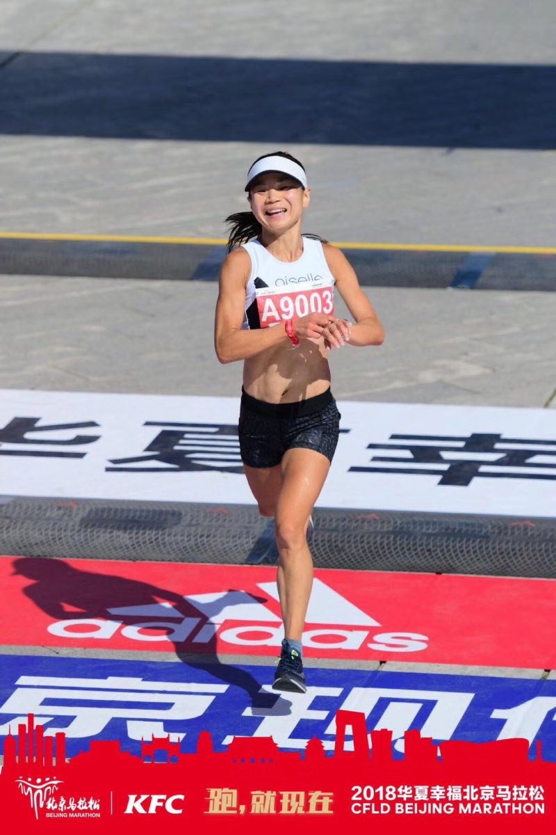 Sophia finishing the 2018 Beijing Marathon